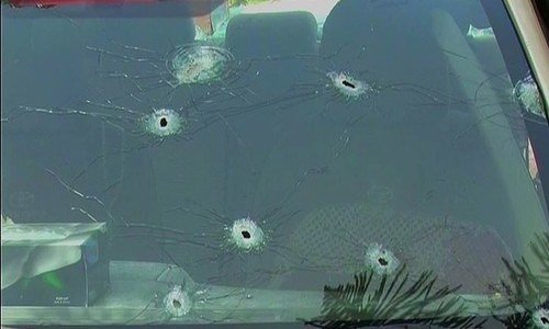 Bullet holes in the windshield of the vehicle. ─ DawnNews screengrab