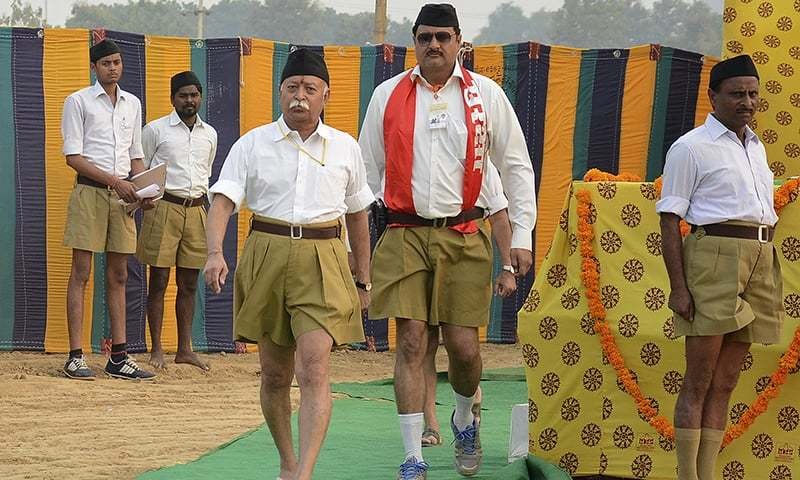 RSS chief Bhagwat walks after addressing a training camp in Agra. Reuters 