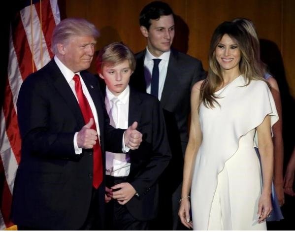 U.S. President-elect Donald Trump greets supporters along with his wife Melania and family during his election night rally in Manhattan, New York, U.S., November 9, 2016. REUTERS/Mike Segar