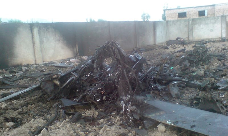 Helicopter wreckage is seen in the compound after US Navy SEAL commandos killed Al Qaeda leader Osama bin Laden. -Reuters/File