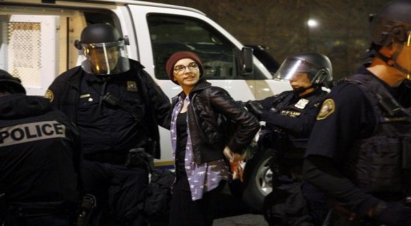 Police detain a demonstrator during a protest against the election of Republican Donald Trump as President of the United States in Portland, Oregon, U.S. November 10, 2016. REUTERS/Steve Dipaola