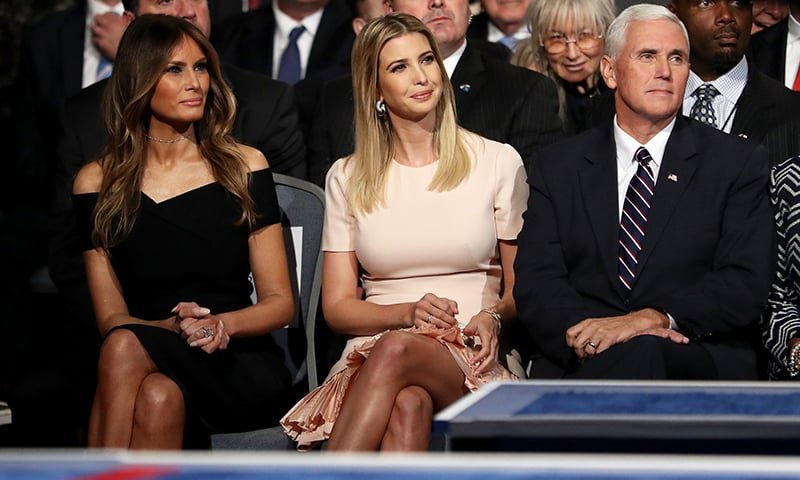 Donald Trump's wife, Melania Trump, daughter, Ivanka Trump and Republican VIce Presidential nominee Mike Pence sit during the Presidential Debate at Hofstra University in Hempstead, New York.— AFP