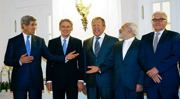 U.S. Secretary of State Kerry, far left and his Iranian counterpart Javad Zarif, second from right, at the nuclear talks in Vienna on Monday. REUTERS