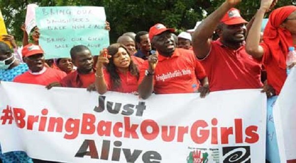 Members of civil society groups shout slogans to protest the abduction of Chibok school girls during a rally pressing for the girls' release in Abuja on May 6, 2014. AFP