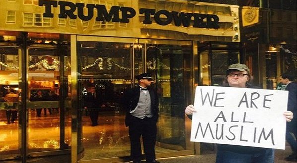 Hollywood filmmaker and peace activist Michael Moore stands in front of Trump Towers in Manhattan, New York.