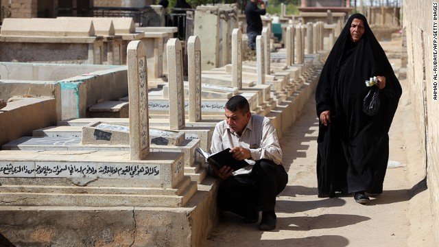 An Iraqi man prays next to the grave of a loved one.  While the Arabs cannot absolve themselves of some historic mistakes, the US invasion of Iraq and the larger Middle East policy has destabilized the whole region. 