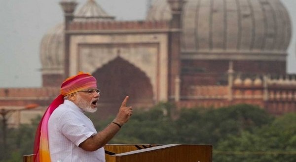 Indian Prime Minister Narendra Modi speaks from the ramparts of Red Fort in Delhi while the iconic Jama Masjid is seen in the background. AP photo.