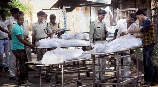 Bodies of SIMI members who were killed in an encounter after they escaped from the Bhopal Central Jail, being handed over to their relatives and family members after post-mortem in Bhopal. (PTI photo)