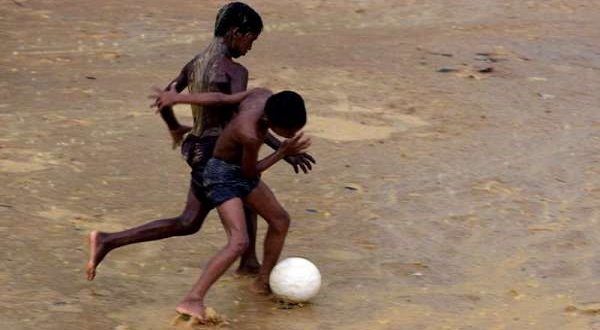 Boys playing football in Bangladesh. The only thing this has to do with Hartman’s post is that it has boys playing football. Also, it’s a lovely picture. UNCHR Bangladesh 