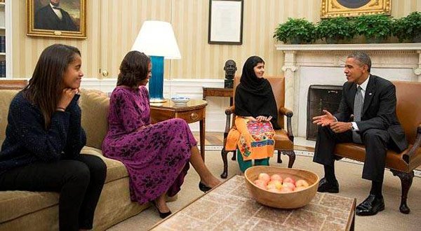 Malala Yusufzai with President Barack Obama and his wife Michelle and daughter Sasha during a meeting at the White House.