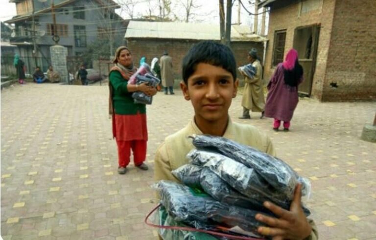 US Based IMRC Helps Hundreds of Fire Victims in Kashmir with Warm Clothes