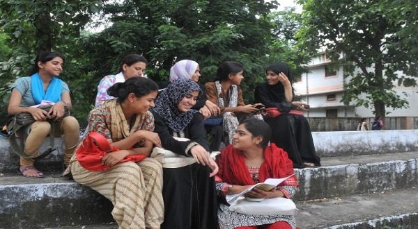 Students relaxing outside the Women's College at the Aligarh Muslim University. Image credit: R.V. Moorthy/The Hindu
