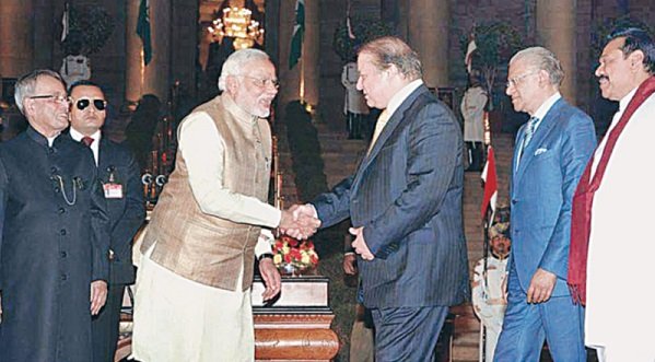 Pakistan Prime Minister Nawaz Sharif shakes hands with Indian Prime Minister Narendra Modi.during the latter's inauguration in May in New Delhi — APP/File 