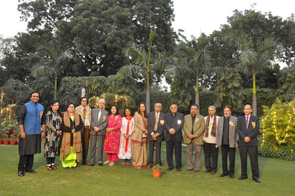 Indian and Pakistani poets pose for a group picture ahead of the mushaira in New Delhi.