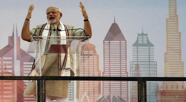 Prime Minister Narendra Modi addresses the Indian diaspora at the Dubai Cricket Stadium. AFP