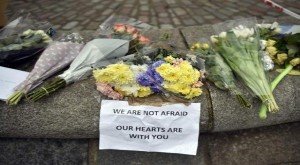 Floral tributes are seen in Westminster the day after an attack, in London.