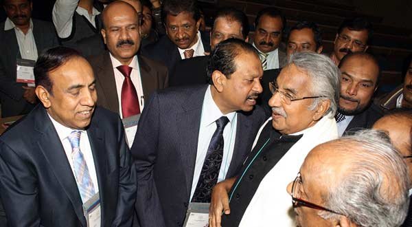 DIASPORA DIALOGUE...Kerala Chief Minister Oommen Chandy interacts with Emke group chief MA Yusuff Ali of Lulu Group and other delegates on the third day of `Pravasi Bharatiya Divas 2014` in New Delhi on Thursday. IANS photo