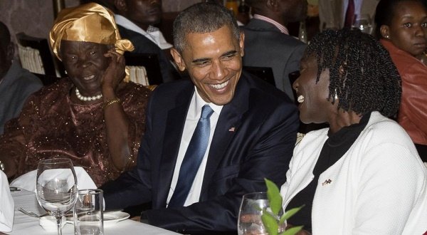 US President Barack Obama sits alongside his step-grandmother, Mama Sarah (L) and half-sister Auma Obama (R), during a gathering of family at his hotel in Nairobi, Kenya, July 24, 2015. AFP/Getty Images