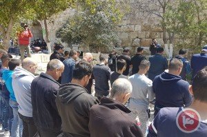 Palestinians pray outside Aqsa