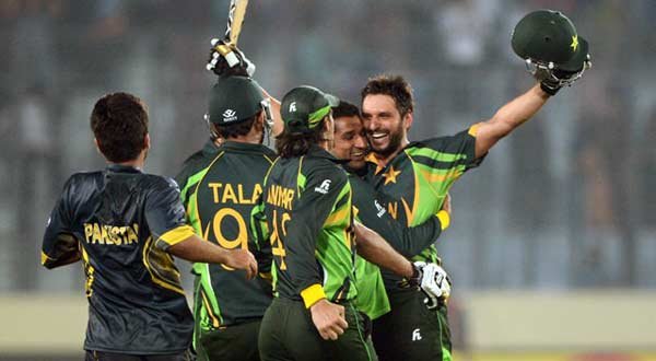 Shahid Afridi of Pakistan is hugged by his team mates after the stunning win over India in the Asia Cup in 