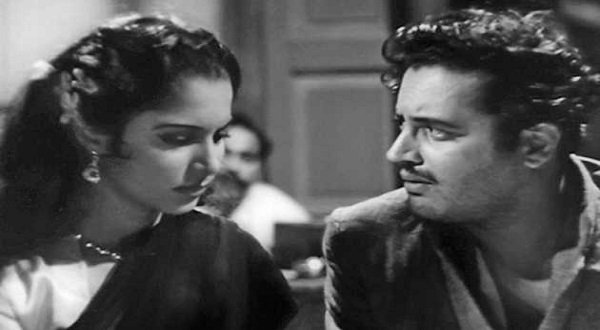  Guru Dutt with his muse Waheeda Rehman in a scene from 'Pyaasa.' Dutt played a poet, a role  apparently inspired by Sahir Ludhianwi