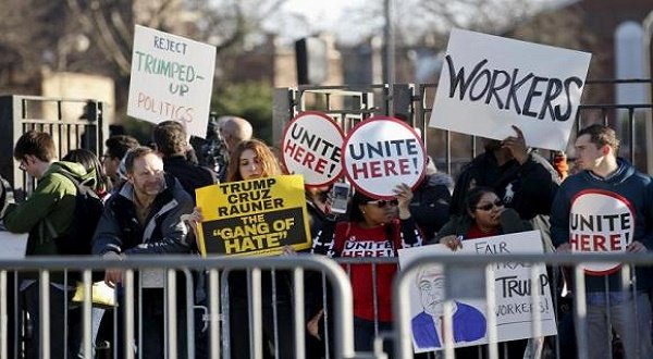 Demonstrators stand outside UIC Pavilion before Republican US.presidential candidate Donald Trump's rally at the University of Illinois at Chicago on Friday. (REUTERS/Kamil Krzaczynski)