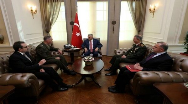 Turkish Prime Minister Binali Yildirim (C), accompanied by Chief of Staff General Hulusi Akar (2nd R), meets with U.S. Joint Chiefs of Staff General Joseph Dunford (2nd L) in Ankara, Turkey, August 1, 2016. Picture taken August 1, 2016. Mustafa Aktas/Prime Minister's Press Office/Handout via REUTERS ATTENTION EDITORS - THIS PICTURE WAS PROVIDED BY A THIRD PARTY. FOR EDITORIAL USE ONLY. NO RESALES. NO ARCHIVE.
