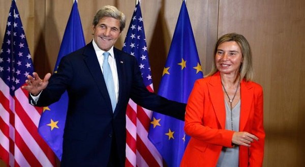 US Secretary of State John Kerry with European Union High Representative Federica Mogherini at the EU headquarters in Brussels, Belgium. AFP photo