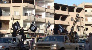 Islamic State jihadists parade through their de-facto capital in the northern Syrian city of Raqa in 2014. AFP photo