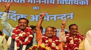 BAdityanath (C) with Deputy Chief Ministers Keshav Prasad Maurya (L) and Dinesh Sharma (R) during a press conference in Lucknow on March 18, 2017. (Photo: IANS)