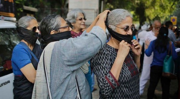 Indian writers stage silent protests against the killing of writers and rising intolerance in India.