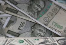 Rupee Slides to Record Low of 92.63 on Strong Dollar, Import Pressure